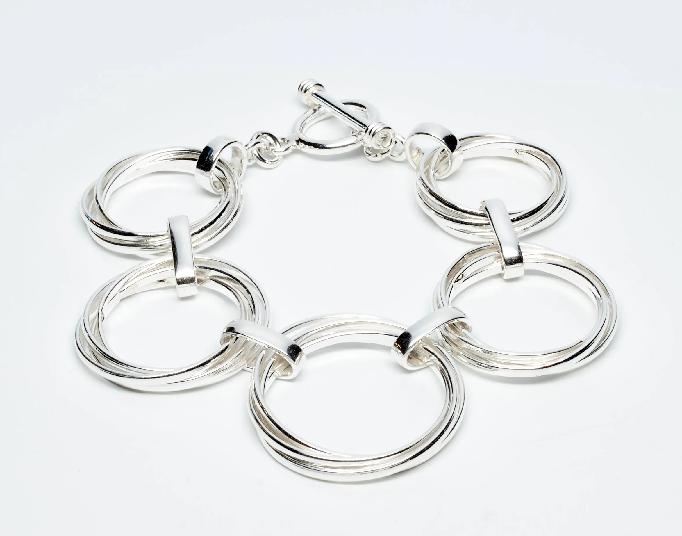 Graduated Interlinked Sterling Silver Set of Necklace, Bracelet and Earrings