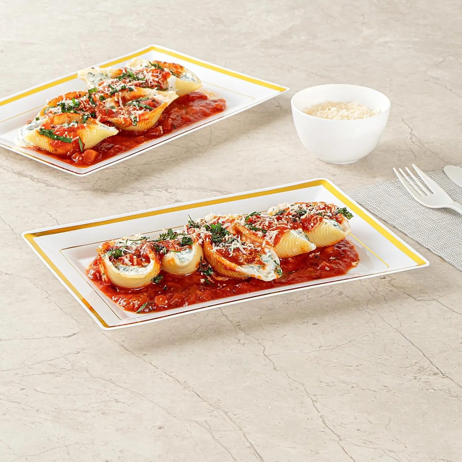 Restaurantware Moderna 9.5 x 6.3 Inch Premium Disposable Plates 100 Rectangular Plastic Plates For Parties - Gold-Rimmed Durable White Plastic Dinner Plates For Warm And Cold Foods