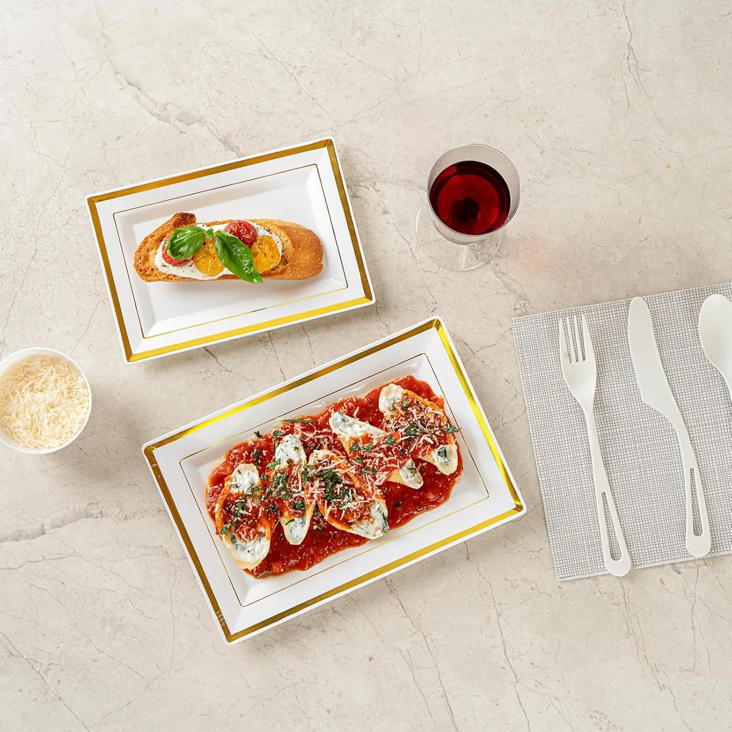 Restaurantware Moderna 9.5 x 6.3 Inch Premium Disposable Plates 100 Rectangular Plastic Plates For Parties - Gold-Rimmed Durable White Plastic Dinner Plates For Warm And Cold Foods