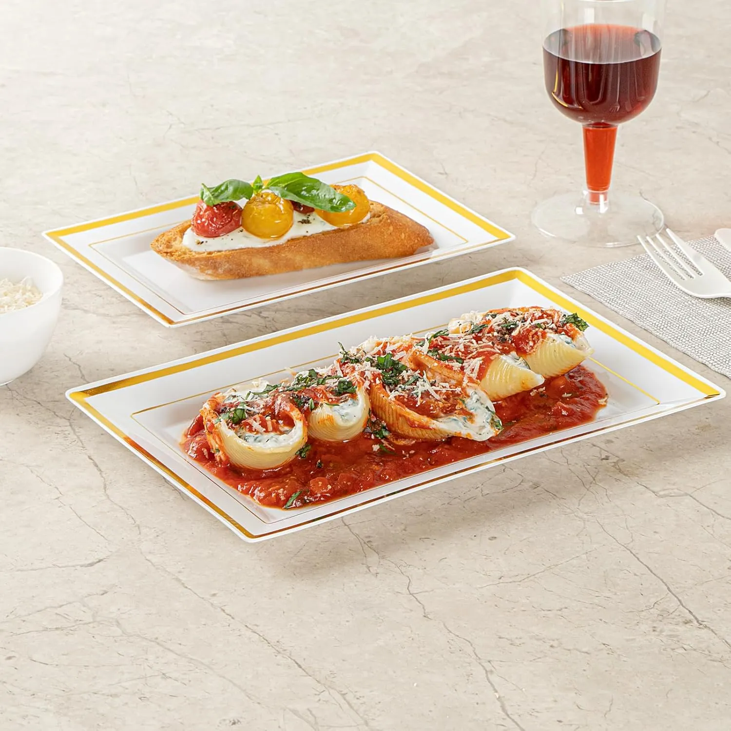 Restaurantware Moderna 9.5 x 6.3 Inch Premium Disposable Plates 100 Rectangular Plastic Plates For Parties - Gold-Rimmed Durable White Plastic Dinner Plates For Warm And Cold Foods